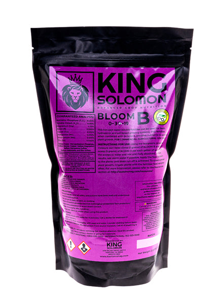 King Solomon Nutrients Bloom B stand-up pouch with magenta label on a black resealable bag, part of the Rooted Intellect Plant Nutrition Kit.