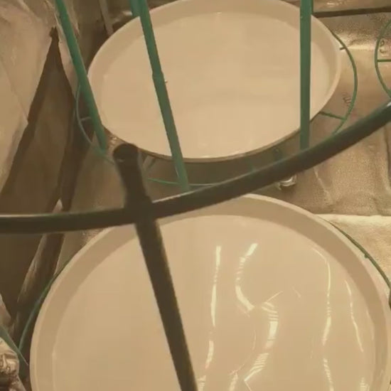 Video showing four assembled Bloom Carousels operating side by side inside a reflective grow tent, highlighting the rotating platforms and adjustable trellis nets for compact, multi-level cultivation.